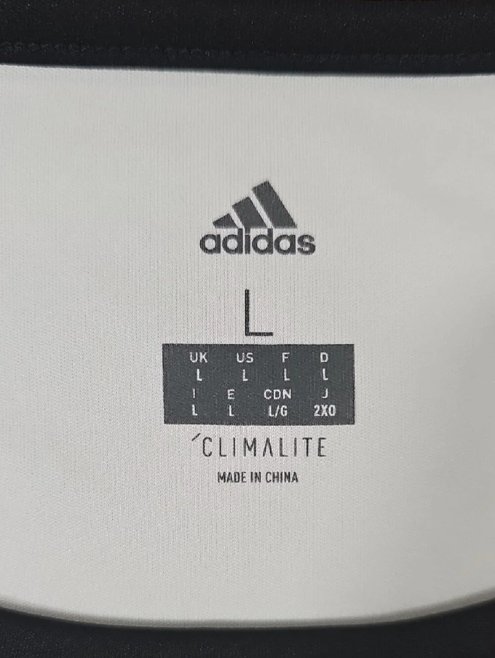 adidas Men’s White Jersey with Black Accents